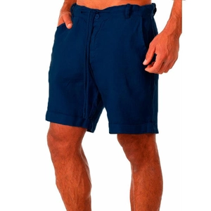 Detail of navy blue cotton linen shorts featuring elastic drawstring waistband and side pockets