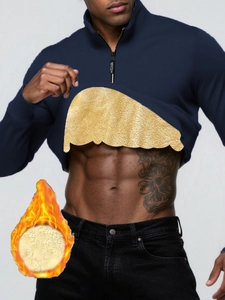 Detail of warm navy blue men's quarter-zip sweatshirt with thick gold fleece lining