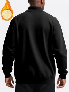 Detail of men's black fleece sweatshirt showing back view and warm plush lining texture