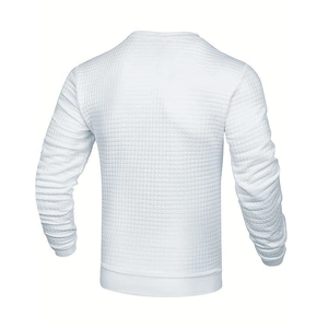 Détails du dos d'un sweat blanc en maille gaufrée avec poignets côtelés et tissu texturé