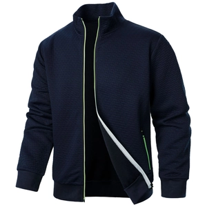 Navy blue men's stand-up collar jacket with neon green zipper details and quilted texture
