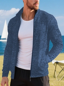 Detail of blue heather knit zip-up cardigan jacket with side pockets for men