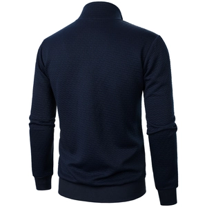 Rear view of men's dark blue zip-up jacket showing knitted texture and ribbed hem
