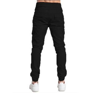 Rear view of black cargo pants with drawstring waist and functional large side pockets