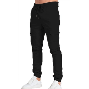 Detail of men's black cargo joggers featuring elastic waistband and functional pockets