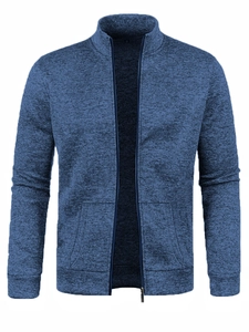 Detail of grey-blue knit cardigan texture with stand collar and full zipper closure