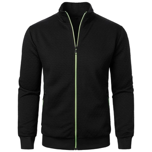 Detail of men's stand collar jacket featuring 3D diamond texture and neon green zipper