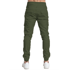 Macro detail of olive green cargo pants featuring back flap pockets and slim fit elastic cuffs