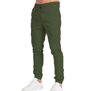 Detail of olive green cargo joggers featuring drawstring waist and large side pockets