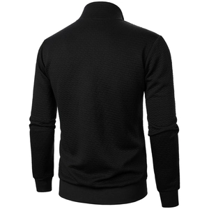 Detail of men's black stand collar jacket with fishbone texture and ribbed hem