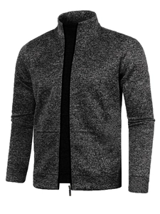 Detailed close-up of men's zip-up knit sweater showing textured grey fabric and stand collar