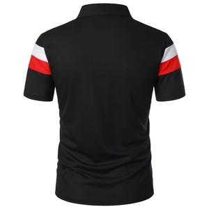 Close-up of black polo shirt sleeve featuring red and white striped color block design