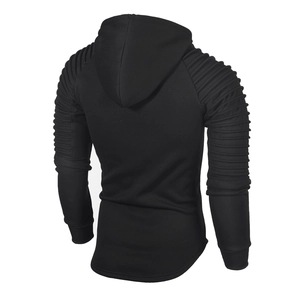 Detail of pleated shoulder and arm design on a black men's slim fit hoodie jacket