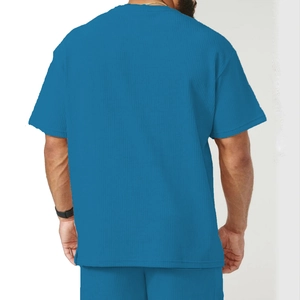Detailed back view of a dark blue corduroy short sleeve set with ribbed texture