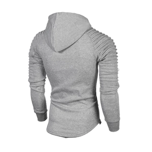 Detail of grey slim fit hoodie showing quilted pleated sleeve design and ribbed cuffs
