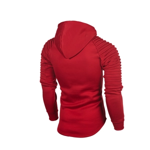 Detail of dark red men's hoodie featuring ribbed texture on shoulders and curved longline hem