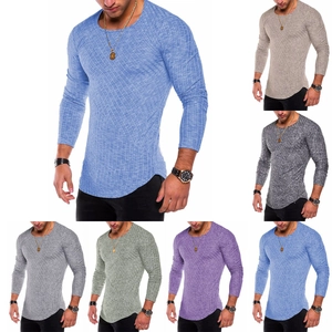 Detail showing the ribbed texture and curved hem of men's slim fit long sleeve knit shirts