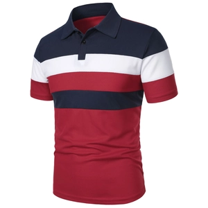 Detail of navy, white, and red color-block polo shirt with polo collar and ribbed texture