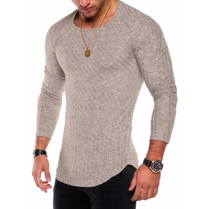 Detailed close-up of men's slim fit long sleeve knit tee with ribbed texture and curved hem