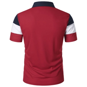Close-up of men's polo shirt back view showing burgundy fabric and navy striped cuffs