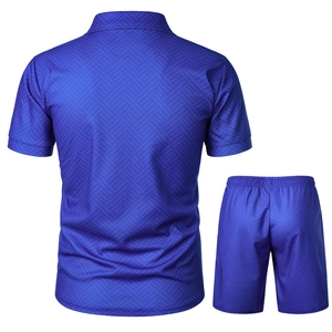 Detailed back view of navy blue polo set showing breathable geometric textured fabric