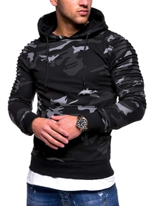 Detail of grey camouflage hoodie featuring pleated raglan sleeves and drawstring hood