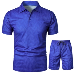 Detail of royal blue men's polo set featuring fine 3D geometric jacquard texture on fabric
