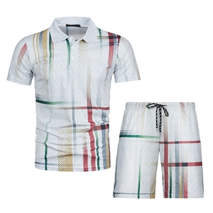 Detail of men's polo set showing breathable fabric texture and colorful geometric print