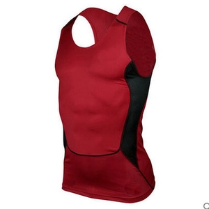 Close-up of red compression vest with side mesh panels and muscular contour design