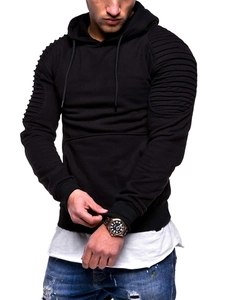 Detail shot of the unique ribbed texture and striped pleats on the black hoodie sleeves