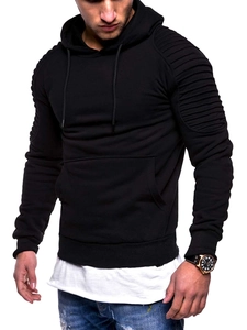Detail of men's black hoodie with textured pleated raglan sleeves and ribbed cuffs