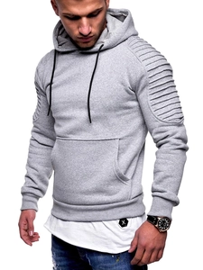 Detail of ribbed shoulder panels and black drawstrings on a grey men's hoodie