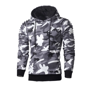 Detail of grey camo hoodie showing pleated shoulder texture and ribbed raglan sleeves