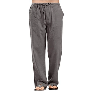 Detail view of grey linen cotton pants with elastic drawstring waist and loose straight fit
