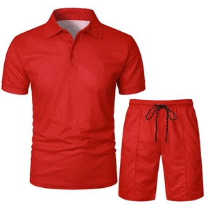 Detail view of the red men's polo set showing 3D geometric fabric texture and drawstring