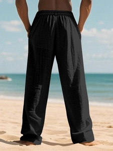 Men's breathable black cotton linen beach pants with elastic waist back view