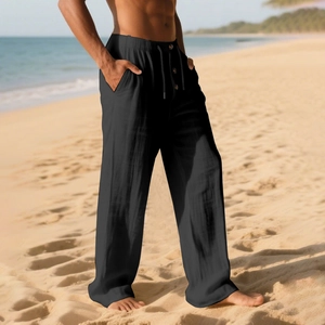 Detail of men's linen casual pants featuring elastic drawstring waist and button accents