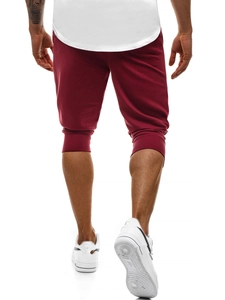 Vista posteriore dettagliata di joggers bordeaux slim fit con polsini a costine
