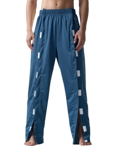 Détail du pantalon de soin bleu marine avec bandes velcro blanches pour la rééducation