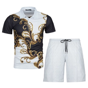 Detail of men's summer polo set featuring golden Baroque scroll patterns and drawstring waist