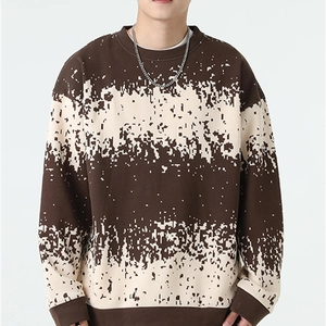 Men's loose knit sweater with brown and beige pixelated texture and classic crew neck