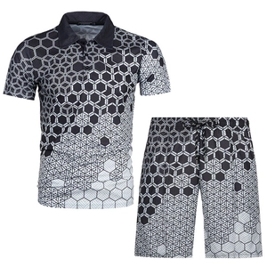 Detail of men's polo set featuring a 3D hexagonal geometric gradient pattern on fabric