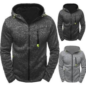 Close-up of men's hooded jacket with fleece lining and vibrant neon green zipper accents