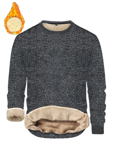 Detailed view of the thick beige fleece lining on a dark gray men's winter sweatshirt