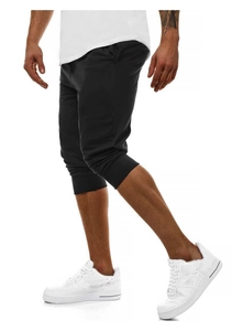 Dettaglio dei jogger neri slim fit da uomo con coulisse regolabile in vita e polsini