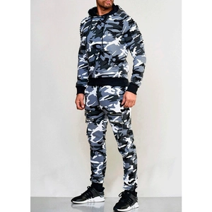 Detailed view of men's camouflage tracksuit featuring cargo pockets and drawstring hoodie