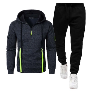 Survêtement homme gris foncé avec détails de fermeture jaune fluo et pantalon noir