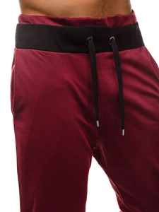 Dettaglio dei jogger bordeaux con elastico in vita nero e coulisse da uomo
