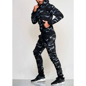 Detail view of men's camouflage tracksuit with metal zip pockets and ribbed hoodie sleeve