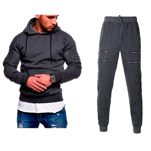 Detail of men's dark grey tracksuit featuring pleated shoulders and zipper cargo pockets